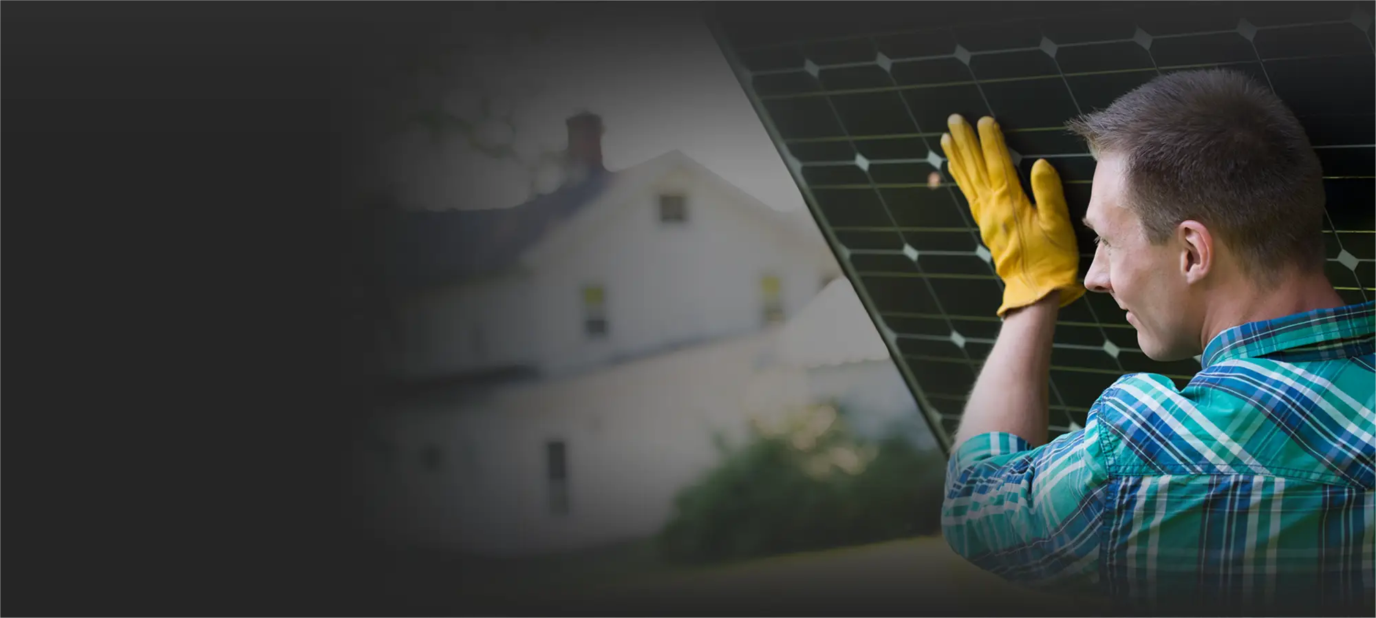Technician installing a solar panel